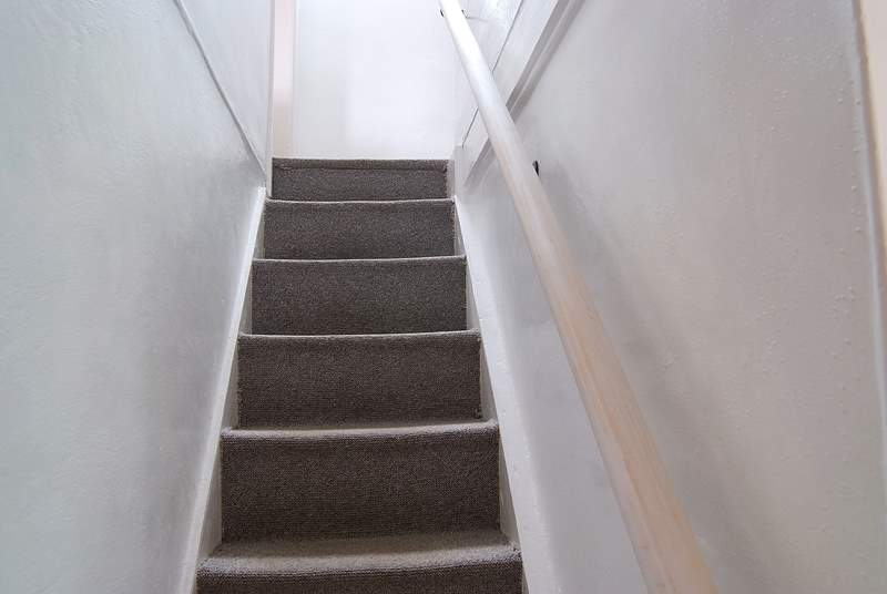 The cottage stairs are typically steep but there is a handrail.