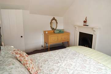 Bedroom 3 features an ornate decorative fireplace.