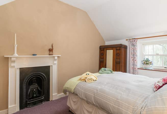Bedroom 3 features an ornate decorative fireplace.