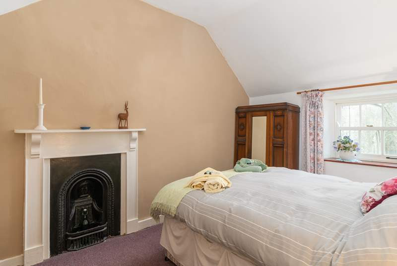 Bedroom 3 features an ornate decorative fireplace.