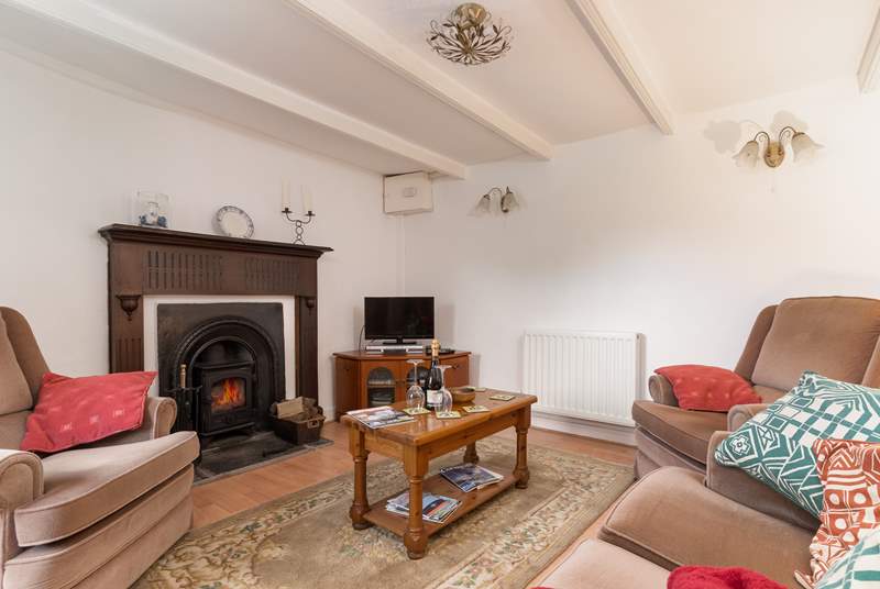 There is a second wood-burner in the sitting-room so you can sit comfortably beside the fire.