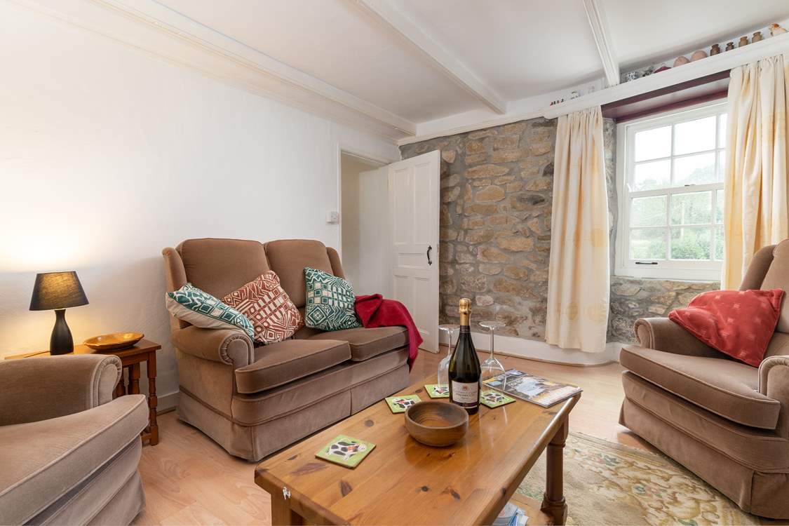 Comfy seating in the sitting-room.