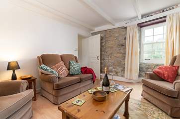 Comfy seating in the sitting-room.