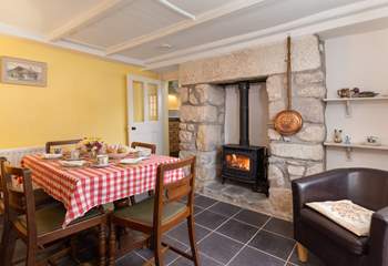 Relax in the dining-room next to the cosy wood-burner.