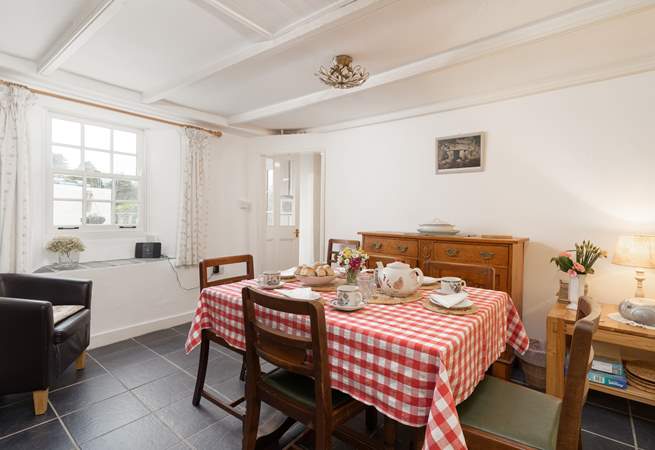 The dining-room, a cosy and comfortable space any time of year and located just off the kitchen.