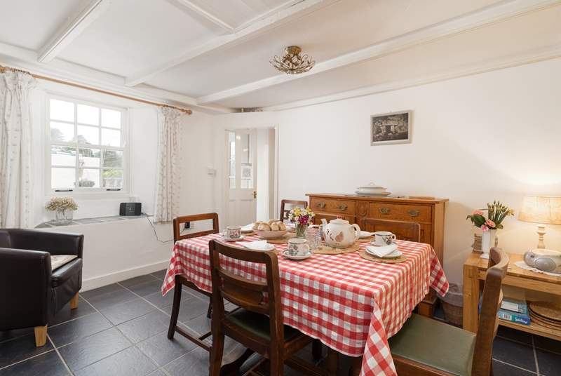 The dining-room, a cosy and comfortable space any time of year and located just off the kitchen.