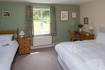 This is Lichen, the ground floor bedroom. There is a 'zip and link' bed which can become twin beds and a further single bed; a great family room.