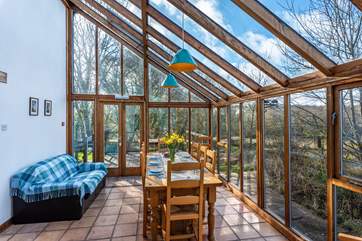 The garden-room makes a fabulous dining space and the views over the nature reserve are uninterrupted.