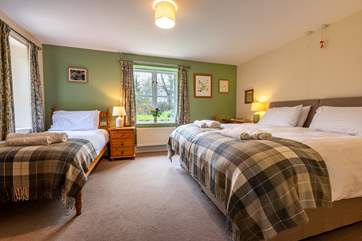 This is Lichen, the ground floor bedroom. There is a 'zip and link' bed which can become twin beds and a further single bed; a great family room.