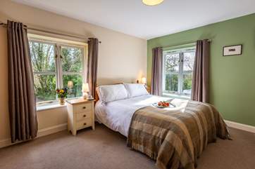 This is Fieldfare, a lovely dual-aspect double bedroom with an en suite shower-room.