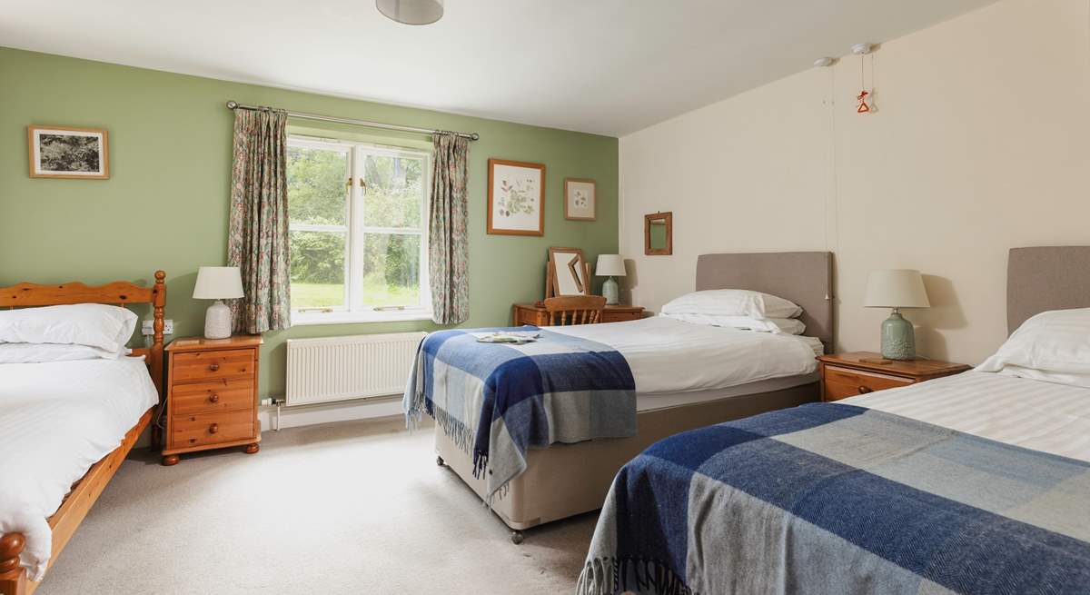 This is Lichen, the ground floor bedroom. There is a 'zip and link' bed which can become twin beds and a further single bed; a great family room.