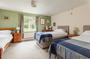 This is Lichen, the ground floor bedroom. There is a 'zip and link' bed which can become twin beds and a further single bed; a great family room.