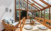 The garden-room makes a fabulous dining space and the views over the nature reserve are uninterrupted. - Thumbnail Image