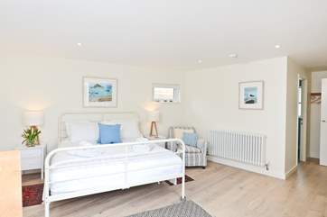 The master bedroom showing the access to the en suite bathroom.