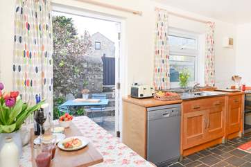 Access to the terrace is from the kitchen.