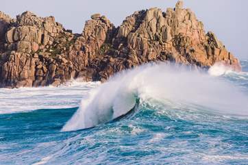 Porthcurno is well worth a visit and is just 10 miles away.
