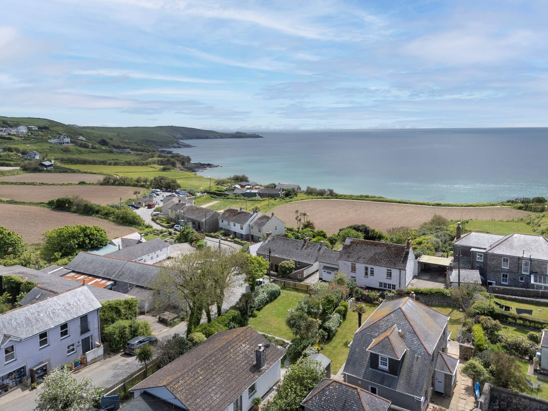 An aerial view of Perranuthnoe, The Summer House is the centre property at the bottom of the picture. Follow the lane to the beautiful sandy beach for an excellent cafe and lunch by the waves.