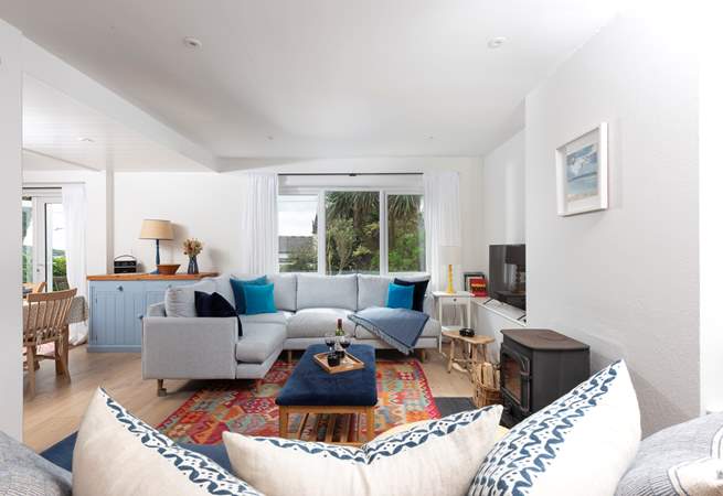 The huge windows fill the home with light.