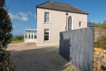 There is plenty of parking for multiple cars, to the right of the gravelled driveway (also shared access for Frog Rock Cottage and the owners residence).