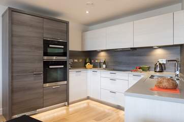 The fabulous kitchen is fully equipped with everything you require.