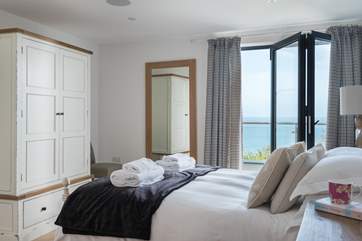 The fabulous main bedroom, with access to the balcony.