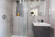 Refresh yourself under the rainfall shower in the sleek en suite bathroom.