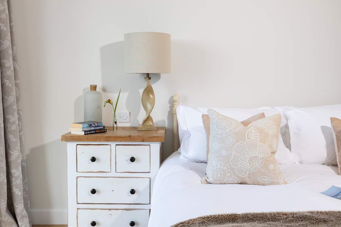 Country style finishes complement this modern apartment.