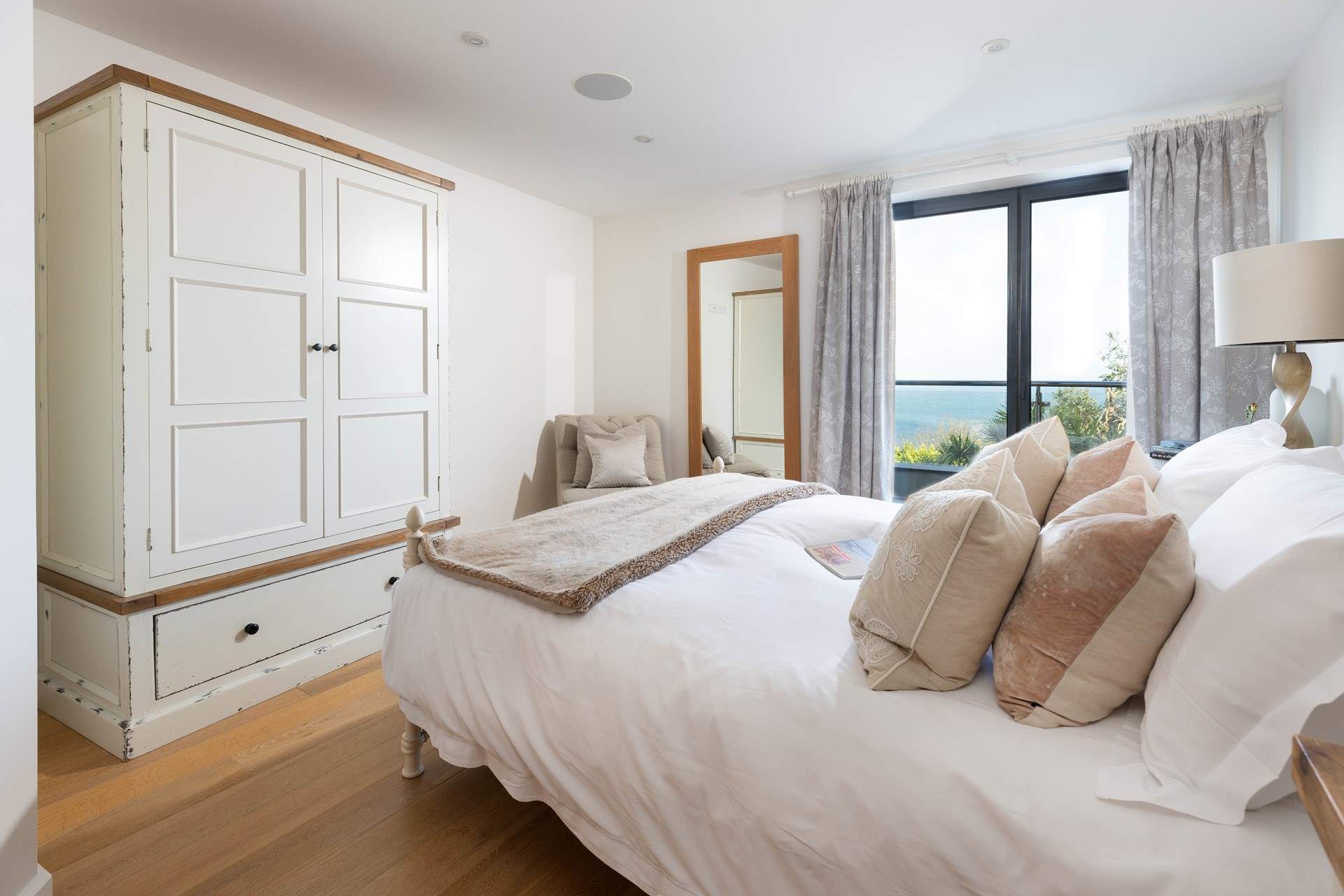 The king-size bed in bedroom 1, relax and wake up to the mesmerising view.