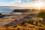 Watch the sun set on the glorious golden sands at Hayle.
