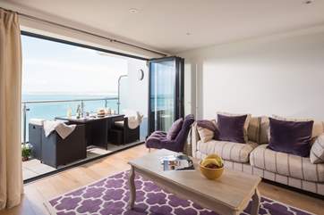 The fabulous open plan living-area has a super balcony area to enjoy.