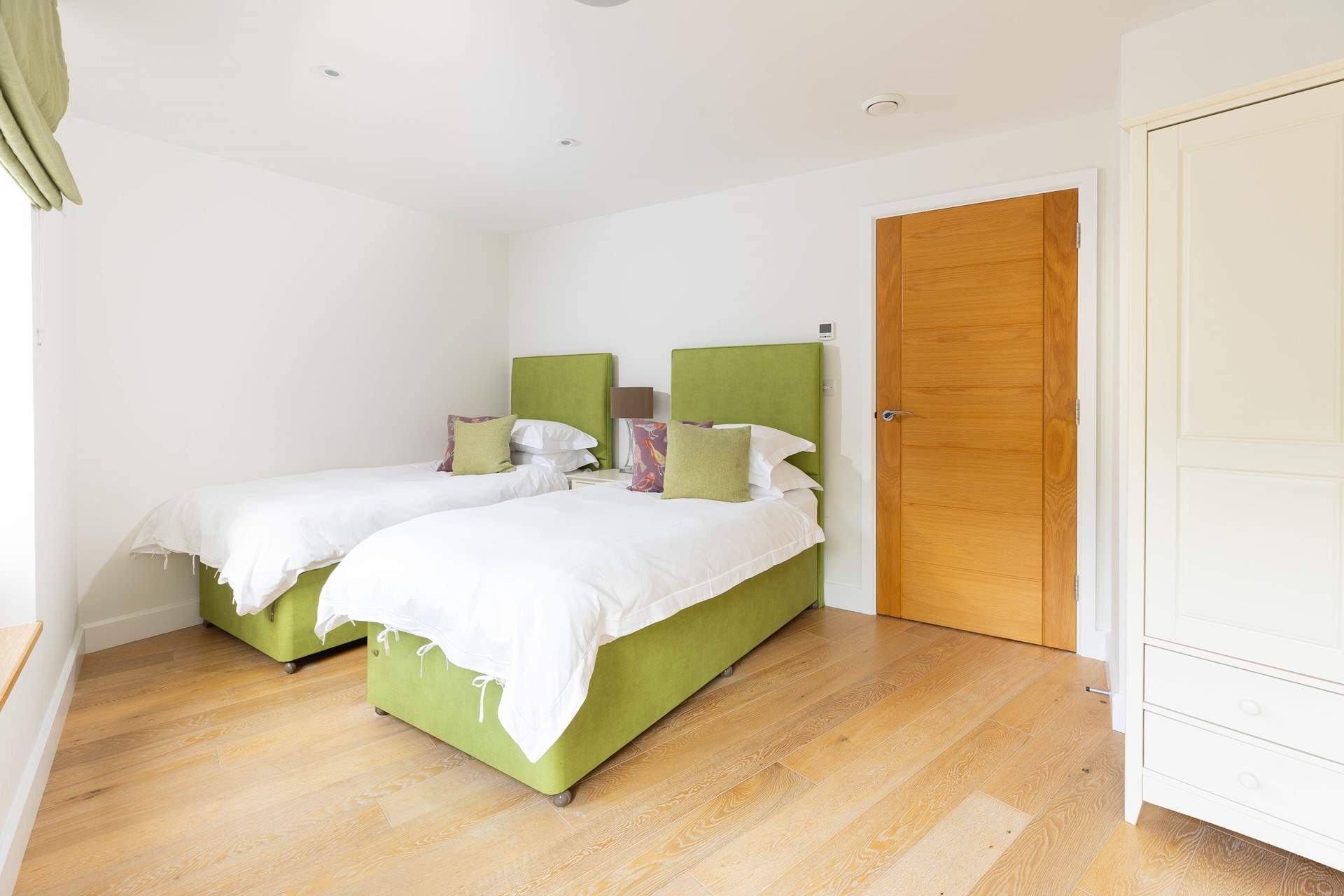 Bedroom 2 is a sweet twin, this room faces the small private car park but has complete privacy.