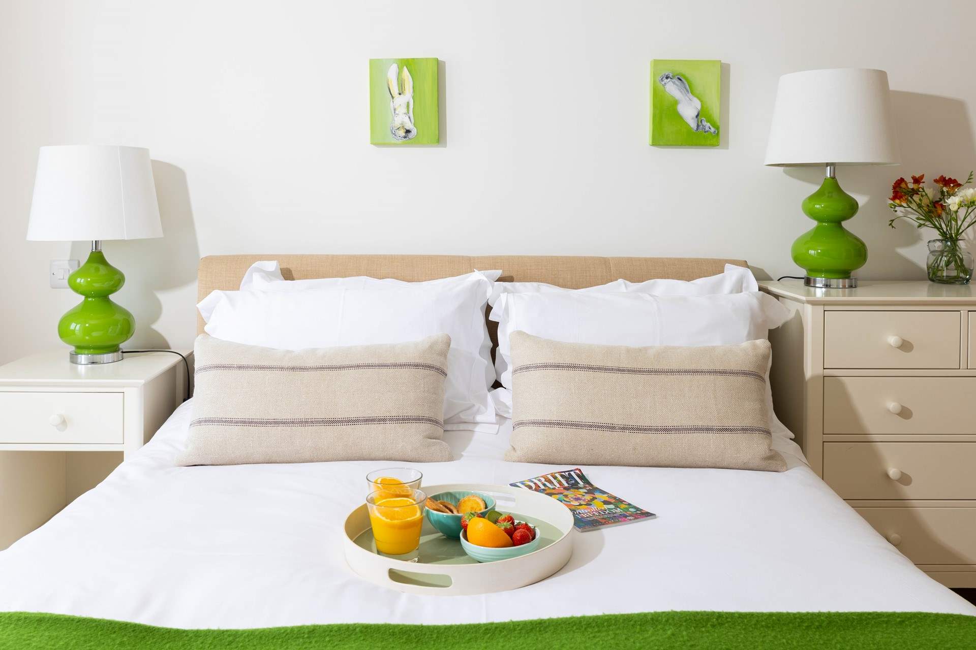 Centre stage in bedroom 1, the plush king-size bed, dressed in luxury linens.