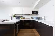 Preparing the party's meals will be a pleasure in this gourmet kitchen.