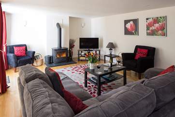 This property has a huge living-area with a cosy wood-burner and French doors to a little secret courtyard.