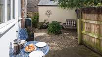 There are two private enclosed courtyard gardens to sit out in, this one is at the rear of the cottage.