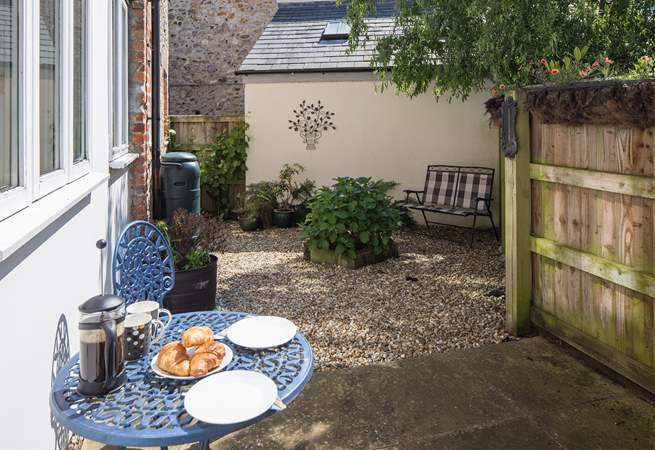 There are two private enclosed courtyard gardens to sit out in, this one is at the rear of the cottage.