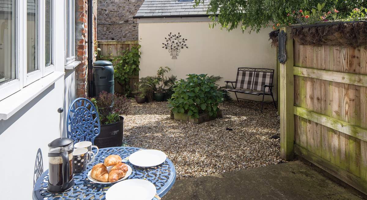 There are two private enclosed courtyard gardens to sit out in, this one is at the rear of the cottage.