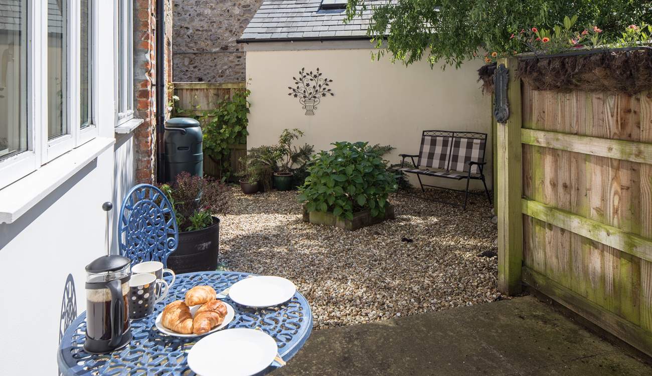 There are two private enclosed courtyard gardens to sit out in, this one is at the rear of the cottage.