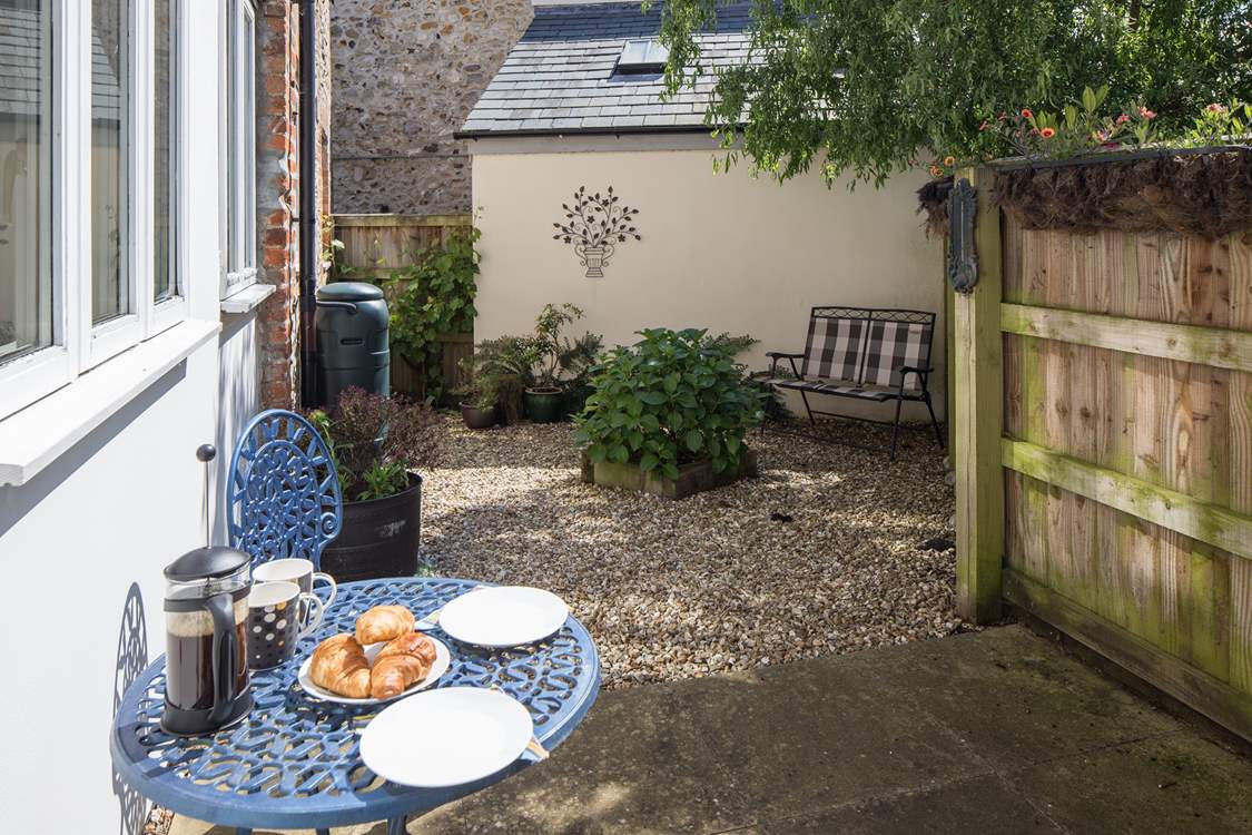 There are two private enclosed courtyard gardens to sit out in, this one is at the rear of the cottage.