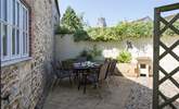 This is the courtyard that greets you, perfect for afternoon tea. - Thumbnail Image