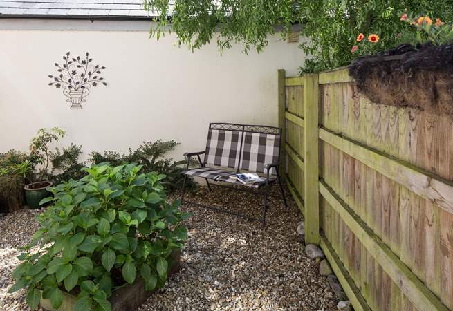 This little courtyard at the rear of the cottage is the perfect place to relax with a good book.