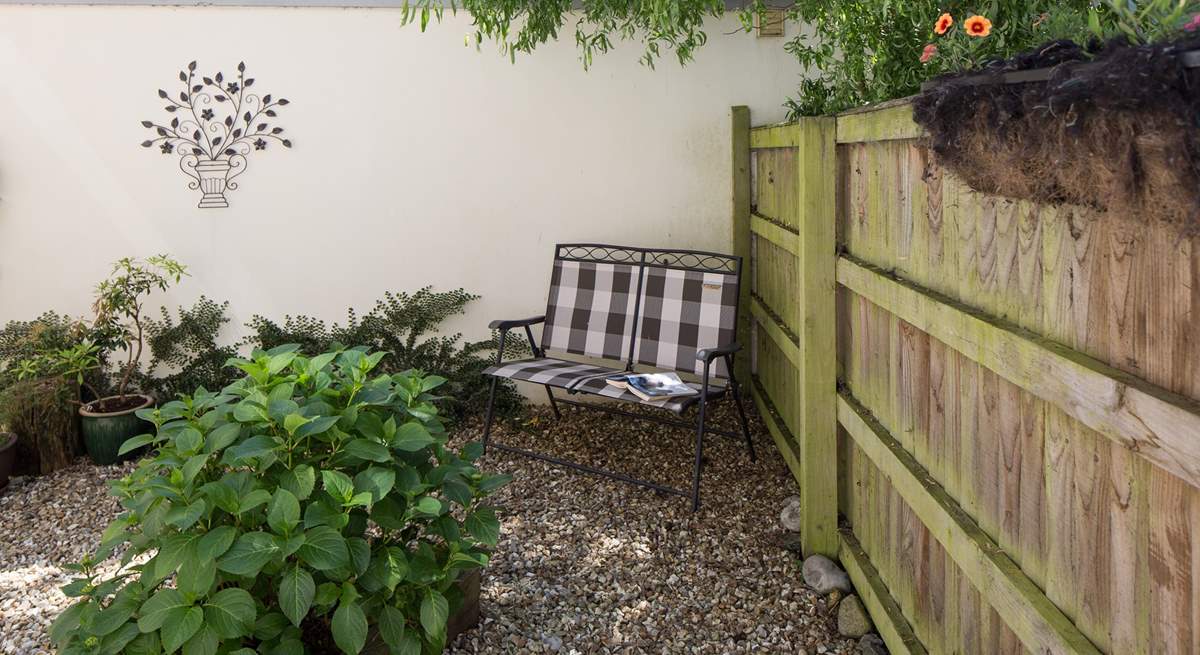 This little courtyard at the rear of the cottage is the perfect place to relax with a good book.