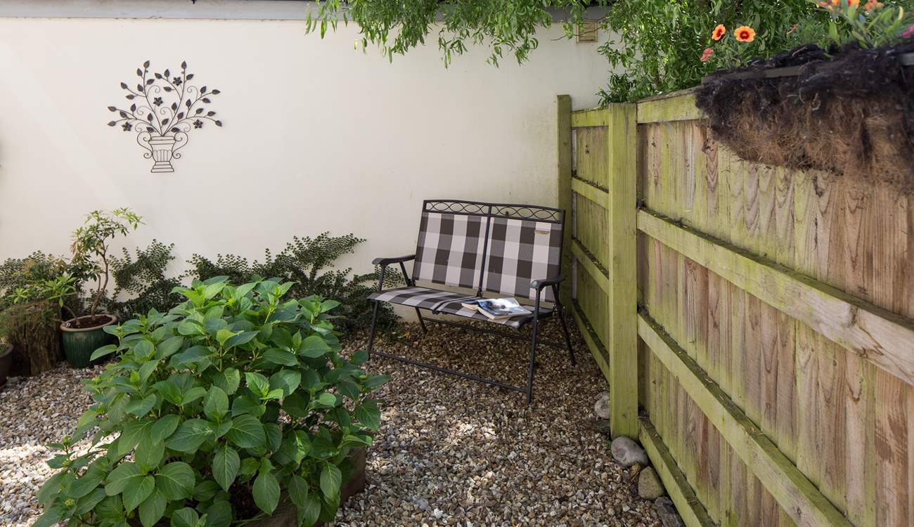 This little courtyard at the rear of the cottage is the perfect place to relax with a good book.