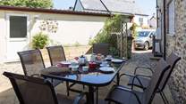 Another view of the courtyard, showing the parking space and door to the garage games-room.