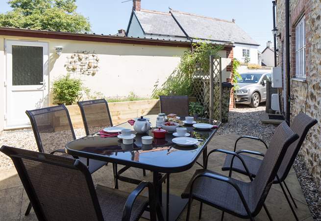 Another view of the courtyard, showing the parking space and door to the garage games-room.