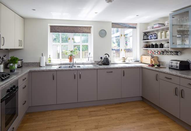 The spacious kitchen - complete with printed blinds of the Jurassic Coast just a few miles away! Your own 'sea view'.