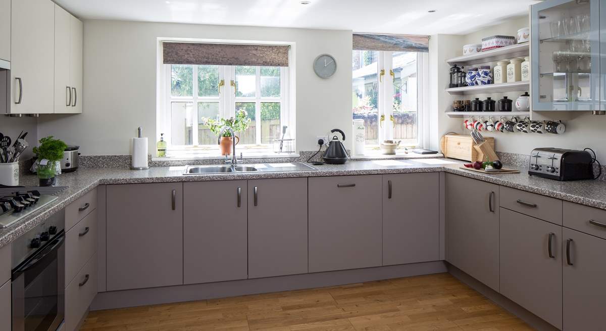 The spacious kitchen - complete with printed blinds of the Jurassic Coast just a few miles away! Your own 'sea view'.