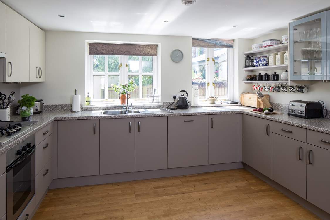 The spacious kitchen - complete with printed blinds of the Jurassic Coast just a few miles away! Your own 'sea view'.