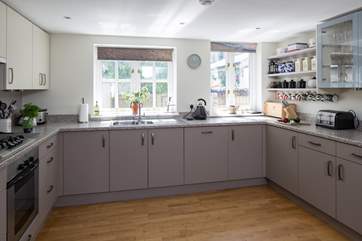 The spacious kitchen - complete with printed blinds of the Jurassic Coast just a few miles away! Your own 'sea view'.