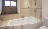 The second bedroom's stylish en suite bathroom. - Thumbnail Image